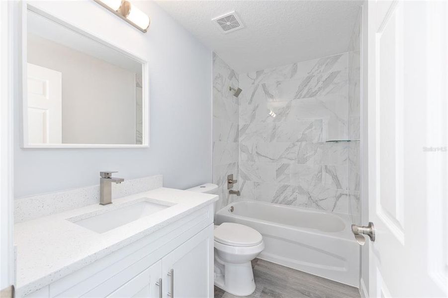 Furnished interior view inside a new home in , Dunnellon (Image 6).