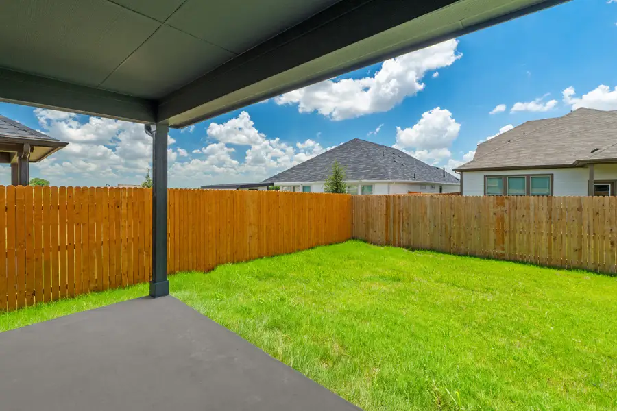 Exterior details and patio area of a home in Prairie Winds, Hutto (Image 4).