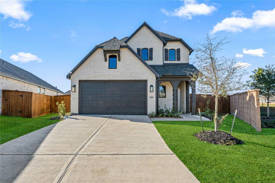 Front exterior of a new home in , Manvel, TX, highlighting curb appeal (Image 2). Front exterior of a new home in , Manvel, TX, highlighting curb appeal (Image 2).