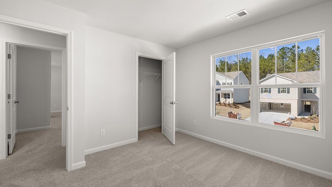 Representative unfurnished interior of a home built from the Belhaven by D.R. Horton in Oaks at Cedar Grove, Fairburn (Image 27).