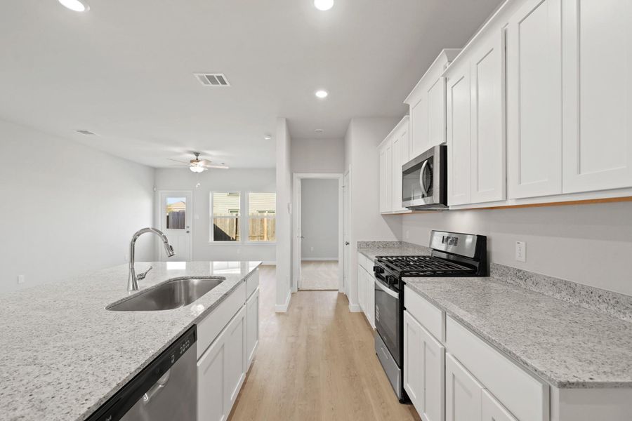 Furnished interior view inside a new home in Riverwood Ranch, Angleton (Image 9).