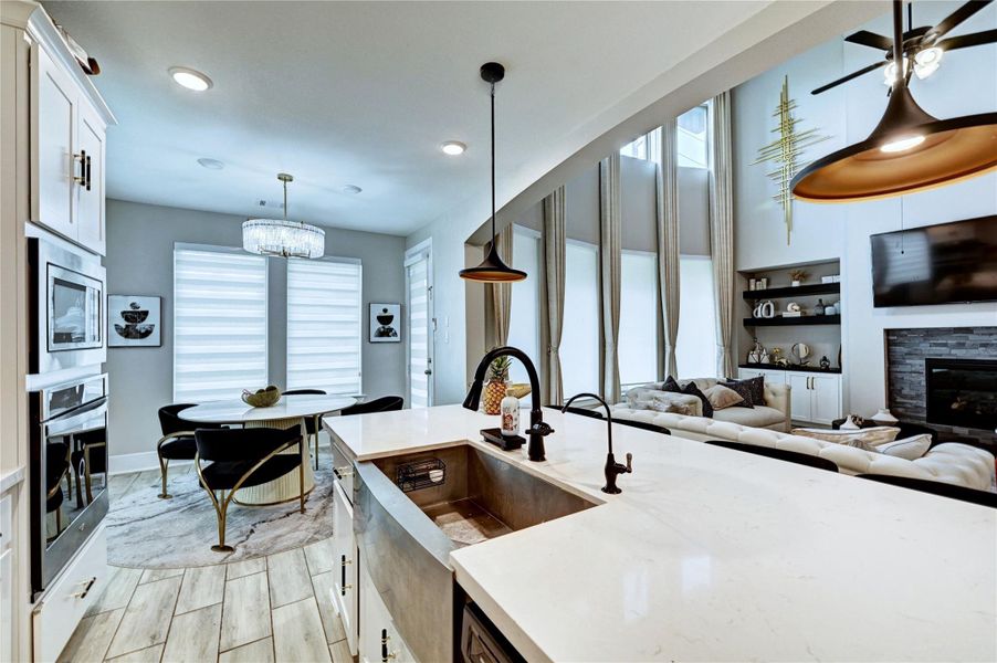 KITCHEN OPENS TO LIVING ROOM