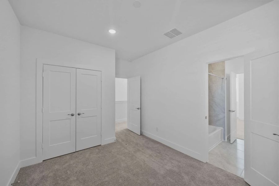 Representative unfurnished interior of a home built from the Cheverny by Chesmar Homes in Bridgeland Chateau, Cypress (Image 30).