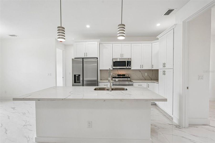 Furnished interior view inside a new home in , Port Charlotte (Image 10).