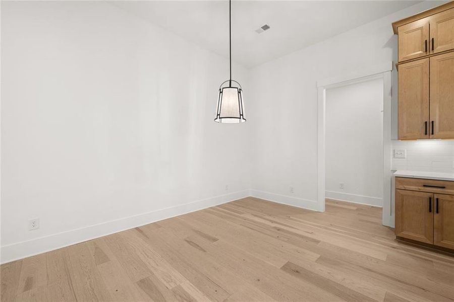 Spacious, unfurnished interior of a new home in Soleil Belmont Park, Canton (Image 36).