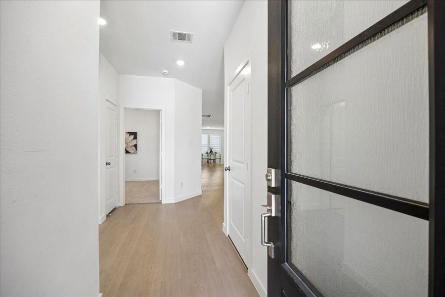 Open this door to comfortable, stylish living, where fresh neutral finishes, LVP flooring and an easy flowing layout welcome you right in. Consider it your first clue that the builder understood the assignment.