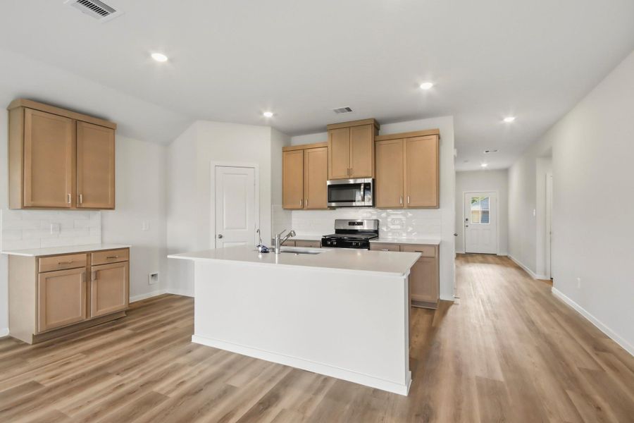 Furnished interior view inside a new home in The Canopies, Splendora (Image 6).