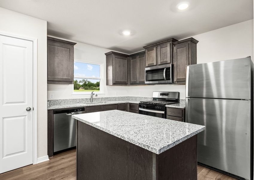The kitchen has beautiful wood cabinetry. The kitchen has beautiful wood cabinetry.