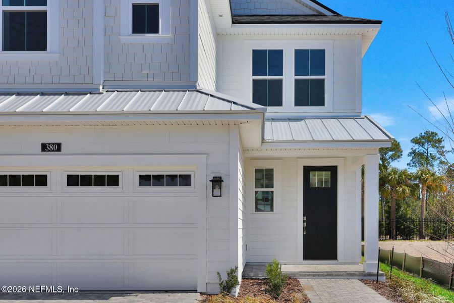 Front exterior of a new home in Seabrook Village at Seabrook, Ponte Vedra, FL, highlighting curb appeal (Image 23).