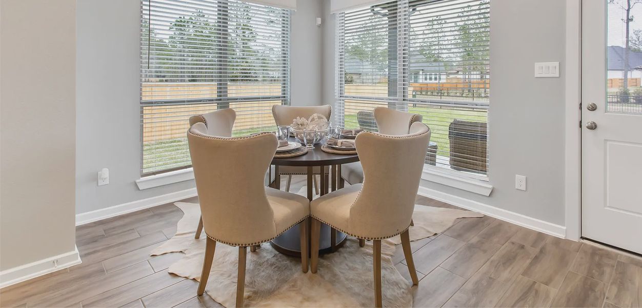 Representative furnished interior of a home built from the Ann Arbor by Chesmar Homes in Sunterra, Katy (Image 6). Representative furnished interior of a home built from the Ann Arbor by Chesmar Homes in Sunterra, Katy (Image 6).