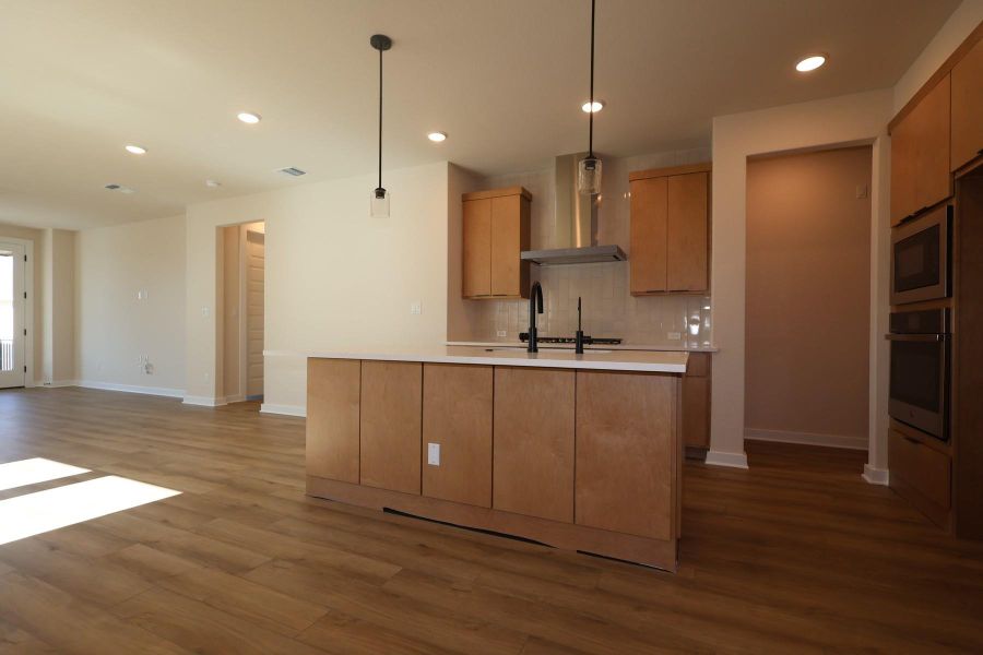 Furnished interior view inside a new home in Heritage, Dripping Springs (Image 5).