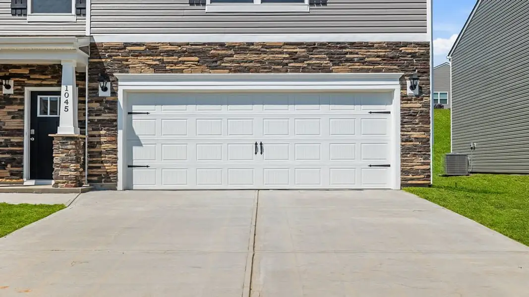 Exterior details and patio area of a home in Benjamin's Grove, Woodruff (Image 4).