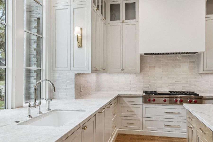 48 inch Wolf gas cooktop with custom plaster hood! Beautiful Antique Tile backsplash! 48 inch Wolf gas cooktop with custom plaster hood! Beautiful Antique Tile backsplash!