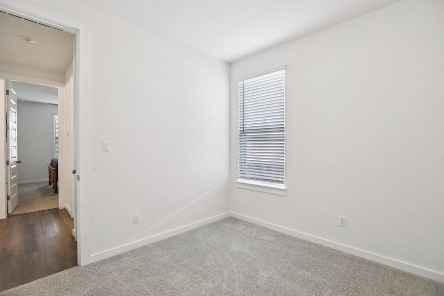Spare room featuring carpet floors Spare room featuring carpet floors