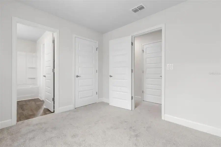 Representative unfurnished interior of a home built from the 2117 by Adams Homes in Flagler Estates, Hastings (Image 31).