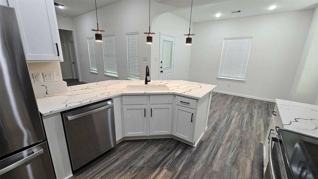 Furnished interior view inside a new home in , Kenefick (Image 13).