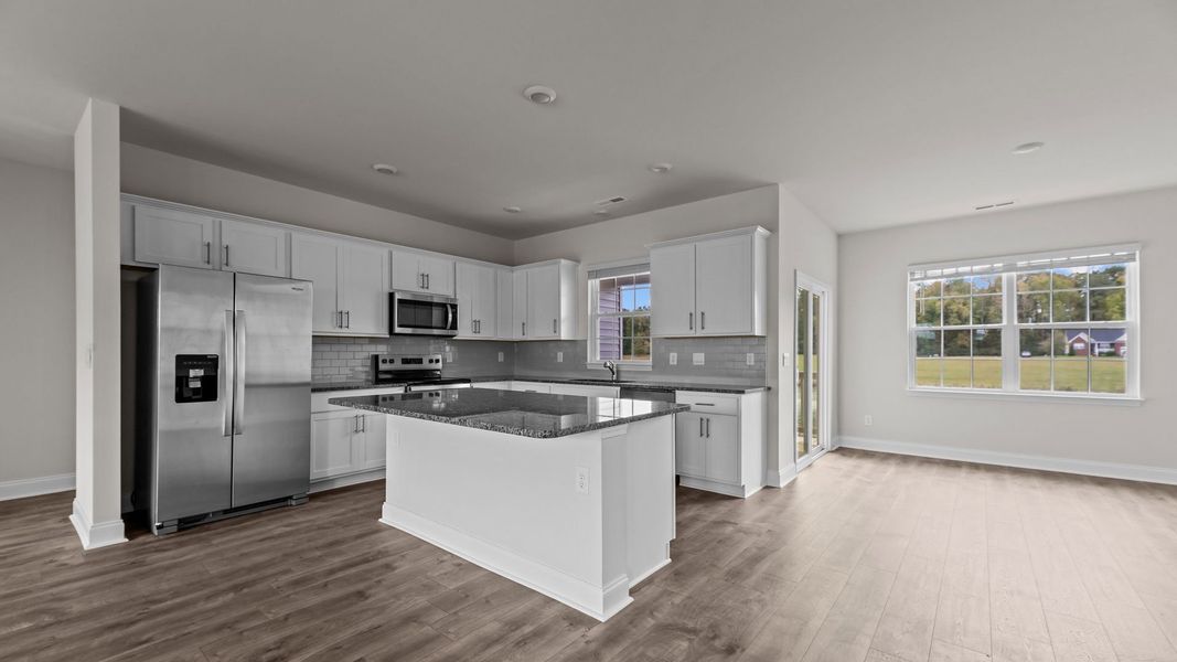 Representative furnished interior of a home built from the Mills by D.R. Horton in Tyler - Home on the Lake, New Bern (Image 4).
