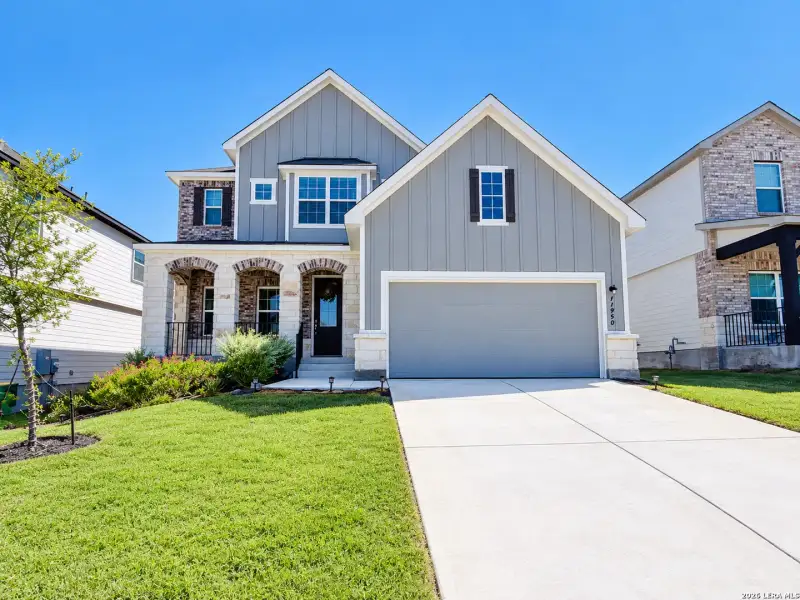 Front exterior of a new home in , Live Oak, TX, highlighting curb appeal (Image 28).