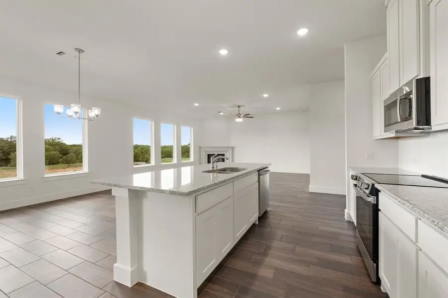 Furnished interior view inside a new home in Saddleback Estates, Boyd (Image 7). Furnished interior view inside a new home in Saddleback Estates, Boyd (Image 7).