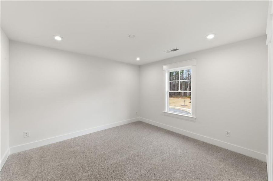 Spacious, unfurnished interior of a new home in Springside Reserve, Powder Springs (Image 24).