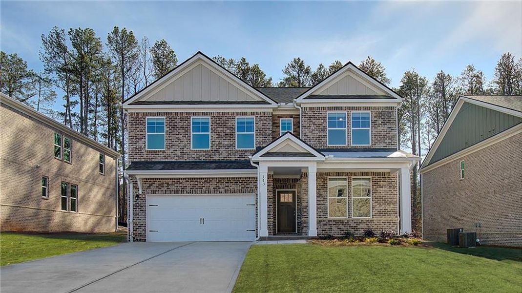 Front exterior of a new home in Bowers Farm, McDonough, GA, highlighting curb appeal (Image 1).