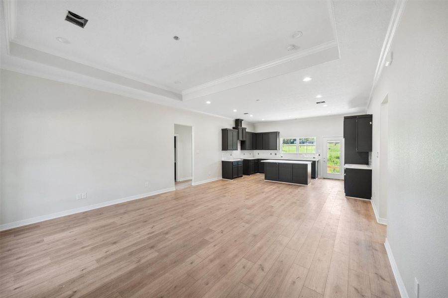 Part of open living room - dining area and kitchen Part of open living room - dining area and kitchen