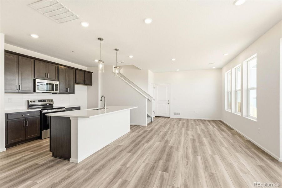 Furnished interior view inside a new home in Turnberry, Commerce City (Image 12).