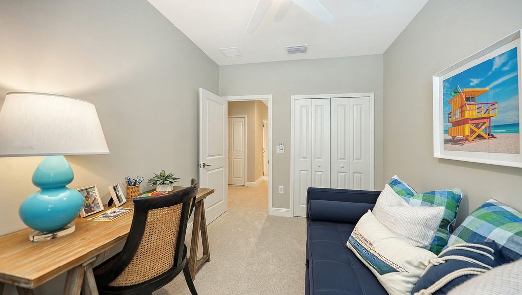 Representative furnished interior of a home built from the Avery by Neal Communities in SkySail, Naples (Image 30).