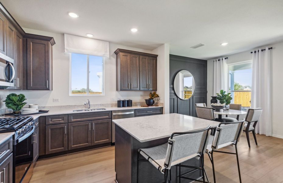 Natural and pendant lighting in kitchen