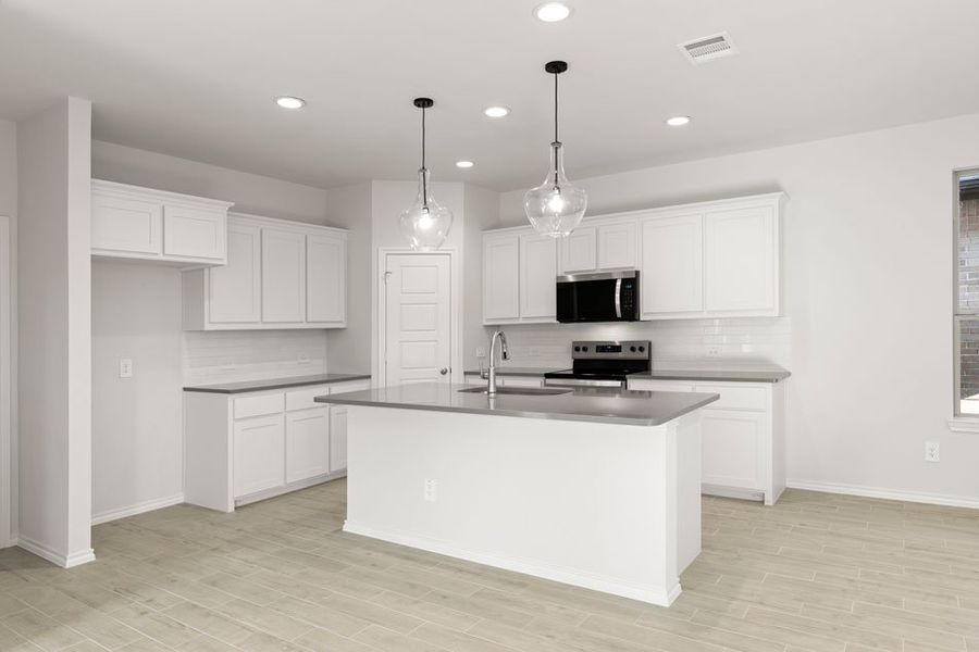 Representative exterior photo of a completed home built from the Maple by Impression Homes in Bryant Farms, Melissa, TX (Image 5). Representative exterior photo of a completed home built from the Maple by Impression Homes in Bryant Farms, Melissa, TX (Image 5).