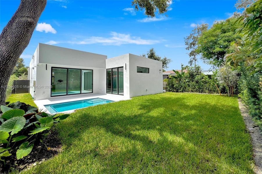 Exterior details and patio area of a home in , Miami (Image 3).