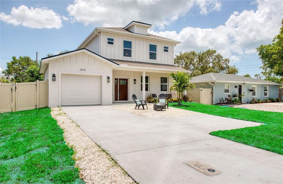 Front exterior of a new home in , Palm Harbor, FL, highlighting curb appeal (Image 1).