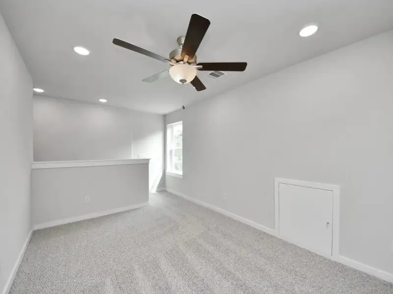 Spacious, unfurnished interior of a new home in Windmill Estates, Magnolia (Image 28).