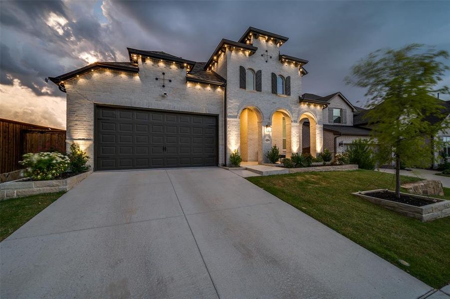 Front exterior of a new home in Sandbrock Ranch: 50ft. lots, Aubrey, TX, highlighting curb appeal (Image 20).