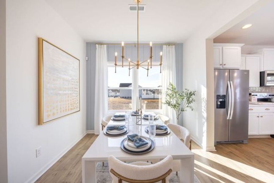 Representative furnished interior of a home built from the Hudson by True Homes in Whispering Hills, Locust (Image 10).