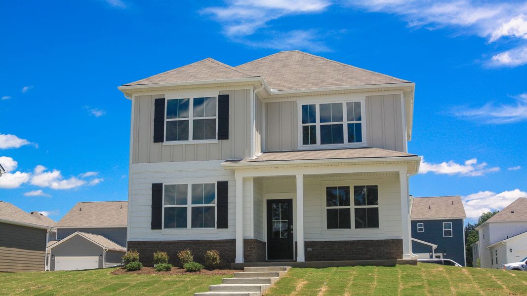 Front exterior of a new home in Reserve at Hickory Ridge, Columbia, TN, highlighting curb appeal (Image 22).