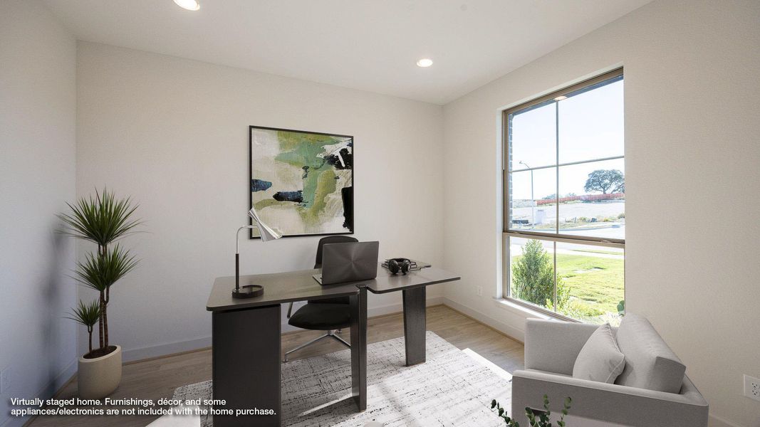 Office featuring light wood-style flooring and recessed lighting Office featuring light wood-style flooring and recessed lighting