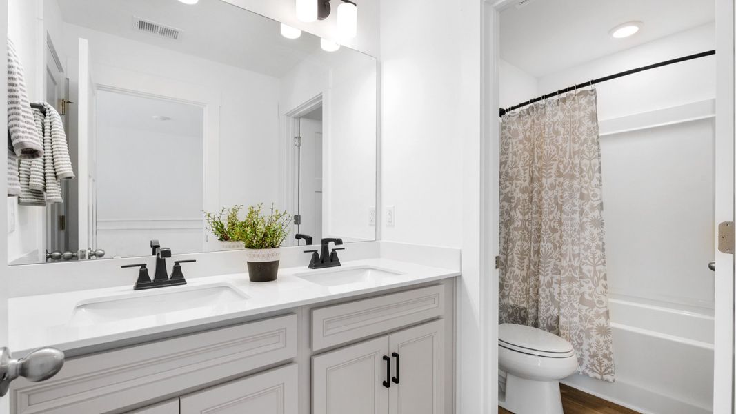 Furnished interior view inside a new home in Woodglen, Piedmont (Image 22). Furnished interior view inside a new home in Woodglen, Piedmont (Image 22).