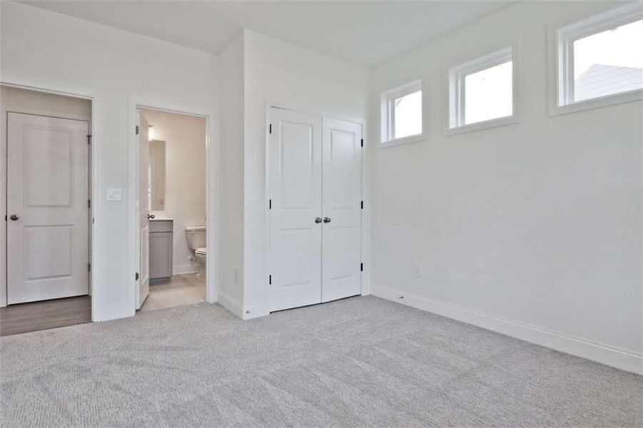 Spacious, unfurnished interior of a new home in The Paddocks at Doc Hughes, Buford (Image 21).