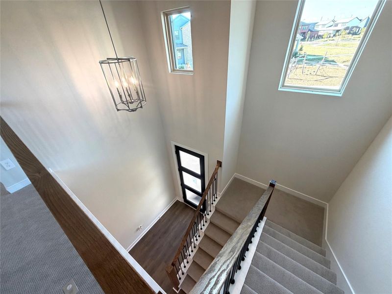 Foyer showcases 20ft ceiling for that wow factor when you great family and friends.