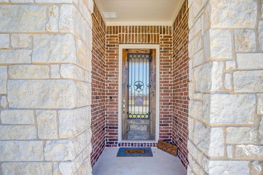 Entrance to property with stone siding Entrance to property with stone siding