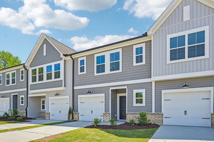 Front exterior of a new home in Towns at The Point, Rolesville, NC, highlighting curb appeal (Image 20).