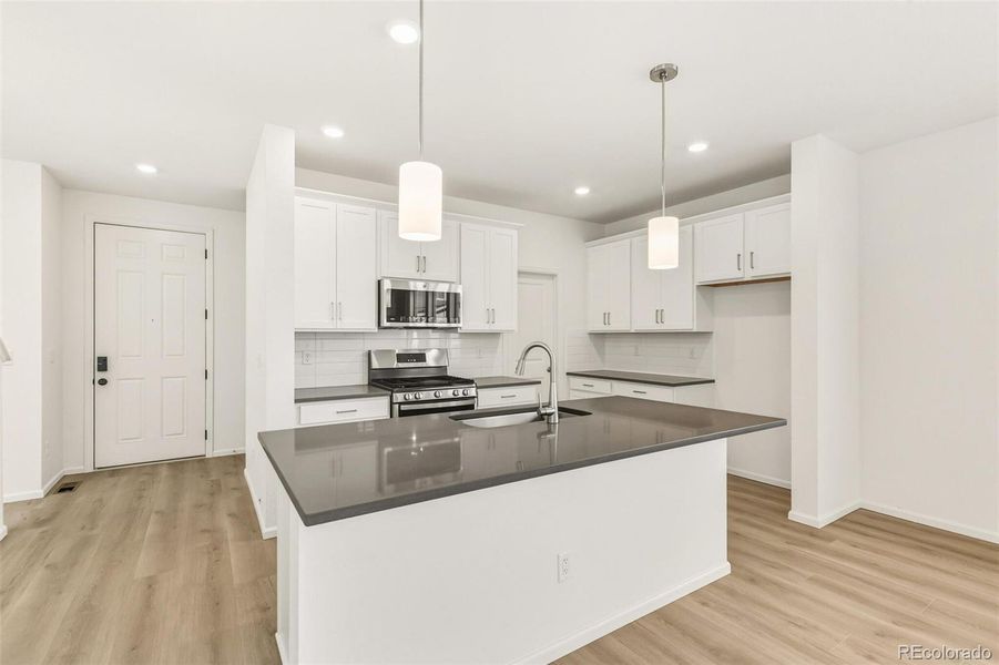 Furnished interior view inside a new home in , Aurora (Image 2).