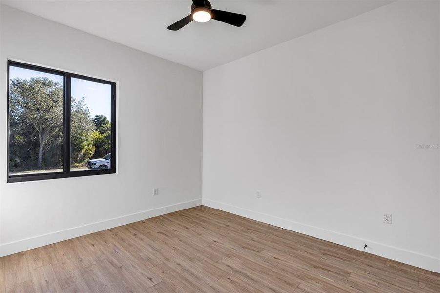 Spacious, unfurnished interior of a new home in , Port Charlotte (Image 22).