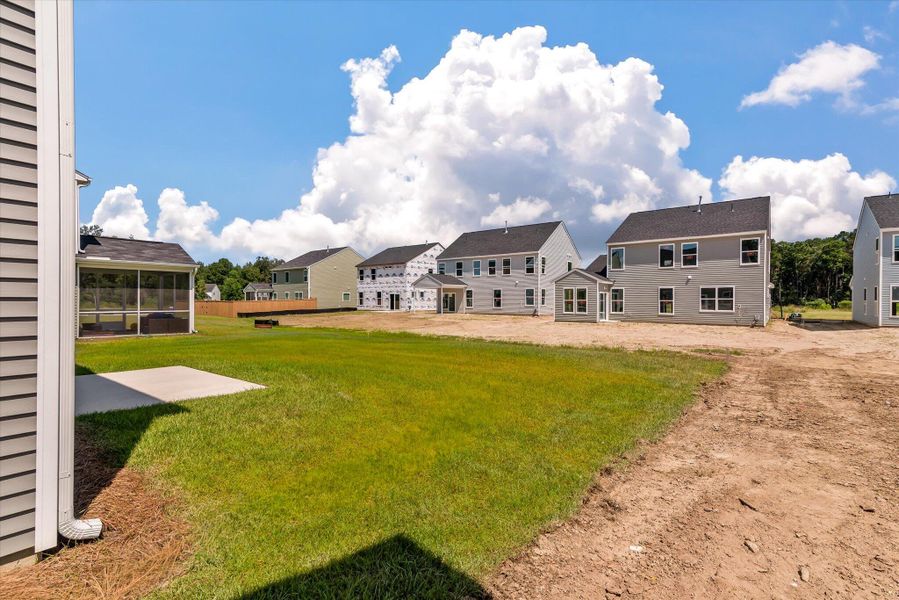 Front exterior of a new home in Oakley Pointe, Moncks Corner, SC, highlighting curb appeal (Image 20).