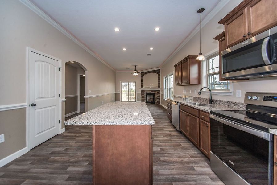 Representative furnished interior of a home built from the Inman by Enchanted Homes in Hampshire Heights, Moore (Image 9).