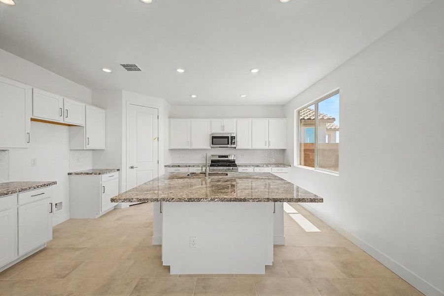 Furnished interior view inside a new home in Bella Vista Farms, San Tan Valley (Image 3).