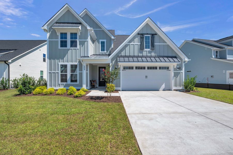 Representative exterior photo of a completed home built from the The Whitley by RobuckHomes in Windwater, Hampstead, NC (Image 36).