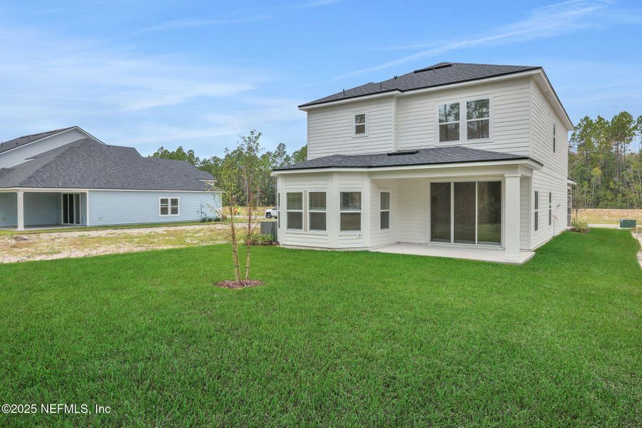 Exterior details and patio area of a home in Brook Forest - Single Family Homes, St. Augustine (Image 21). Exterior details and patio area of a home in Brook Forest - Single Family Homes, St. Augustine (Image 21).