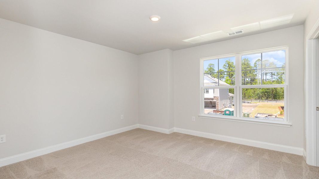 Spacious, unfurnished interior of a new home in The Ranch, Holly Hill (Image 18).